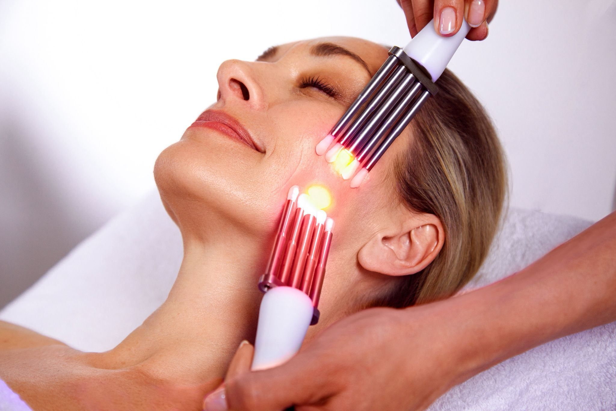 Professional CACI facial treatment using microcurrent technology